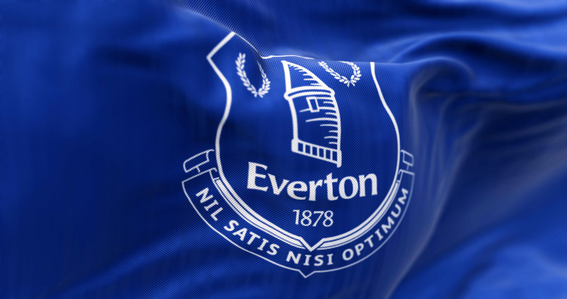 Close up of Everton Football Club flag waving