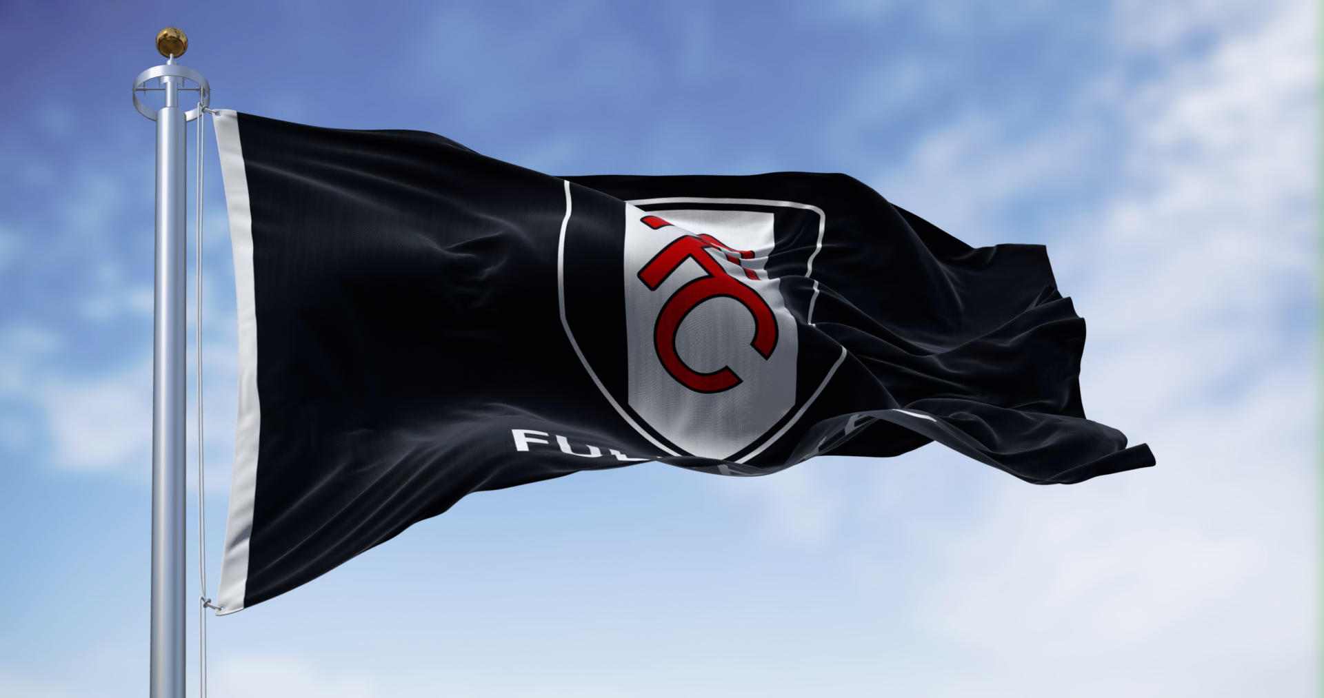 flag of Fulham Football Club waving on a clear day