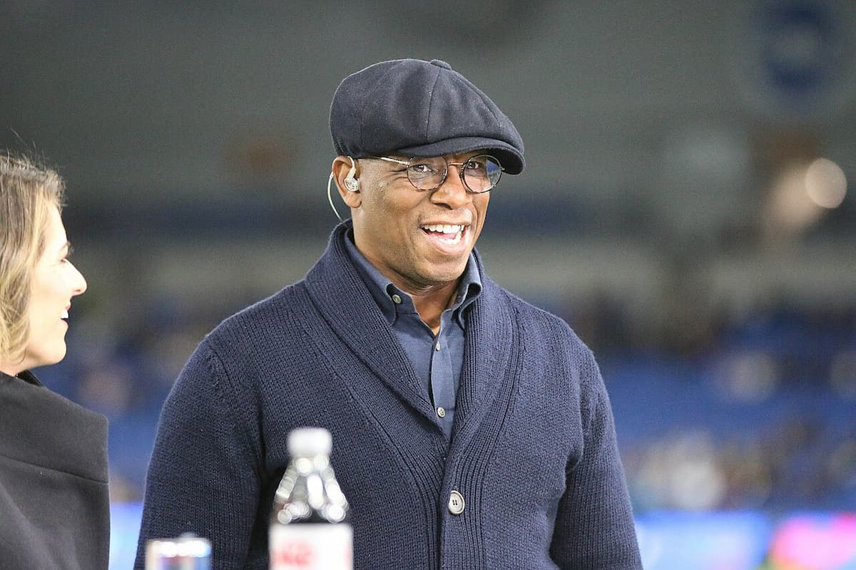 Ian Wright smiling on a football pitch during a charity match