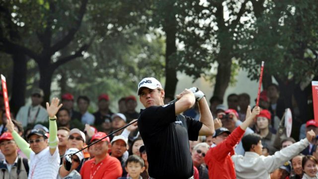 Ernie Els swinging a golf club during a professional tournament