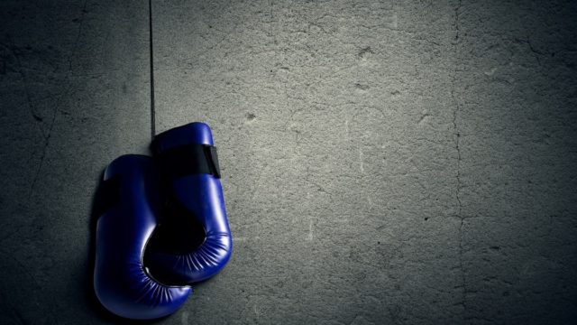 Ricardo López throwing a punch during a world championship boxing match