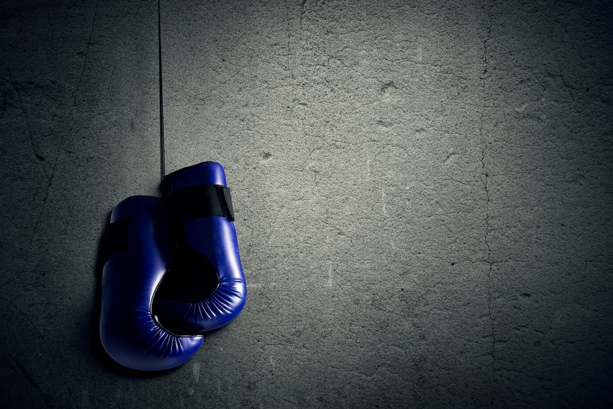 Ricardo López throwing a punch during a world championship boxing match