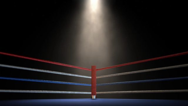 Gennady Golovkin throwing a right hook in a boxing match