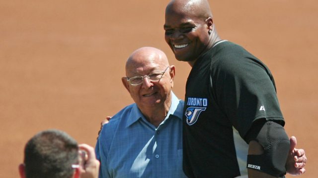 Angelo Dundee in Muhammad Ali’s corner giving tactical advice during a boxing match