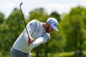 Dustin Johnson celebrating a win in LIV Golf after securing multimillion earnings