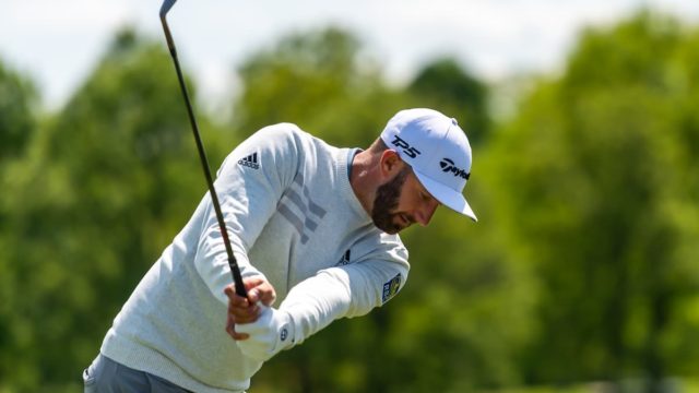 Dustin Johnson celebrating a win in LIV Golf after securing multimillion earnings