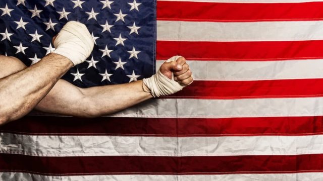 Portrait of Gerry Cooney showcasing his powerful stance during a boxing match