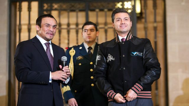 Juan Manuel Márquez celebrates victory in the boxing ring