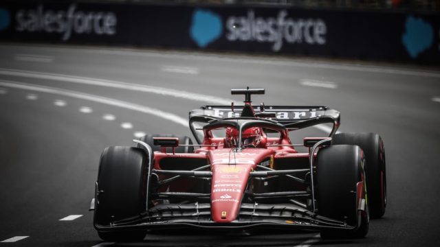Charles Leclerc celebrating on Ferrari podium in Formula 1