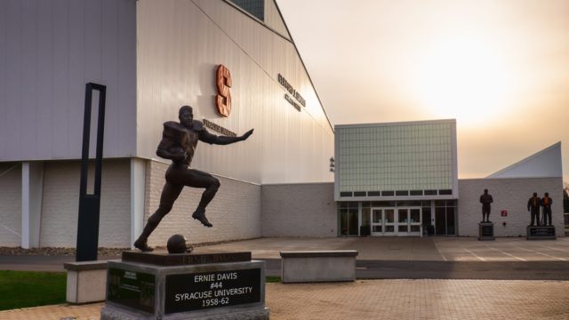 Ernie Davis smiling in Syracuse University football uniform