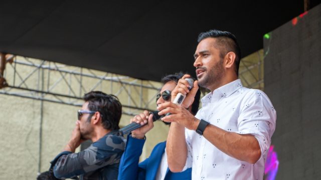MS Dhoni smiling in Chennai Super Kings jersey