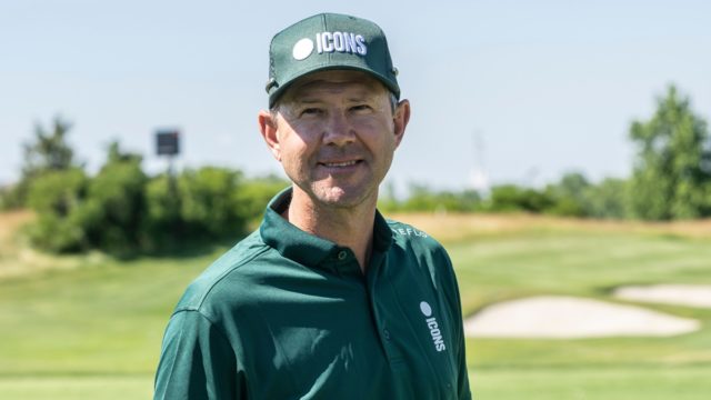 Ricky Ponting celebrating a century for Australia, symbolising his $75 million net worth and cricket legacy