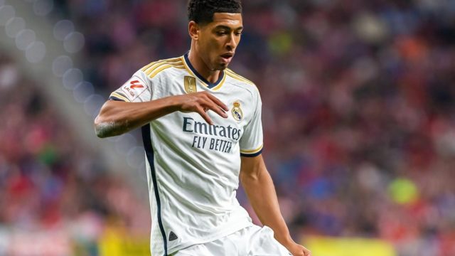 Jude Bellingham celebrating a goal for Real Madrid during the 2025 season, symbolising his superstar salary and status.