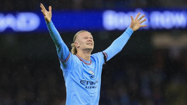 Erling Haaland net worth guide with Manchester City striker in action
