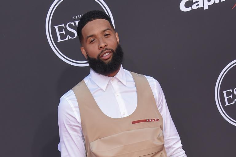 Odell Beckham Jr net worth feature image with NFL-style stadium background and money theme