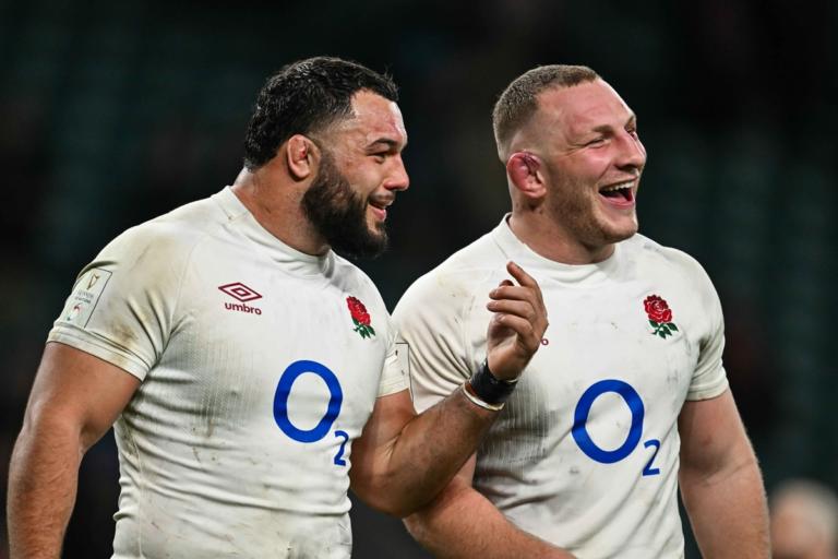 Rugby players competing for the ball during a match as rugby rules are explained